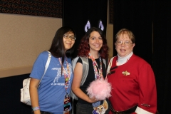 Jennie presents a TAS Tribble to Freedom Service Dogs